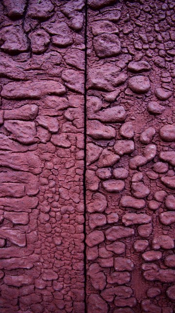 Image red and black brick wall