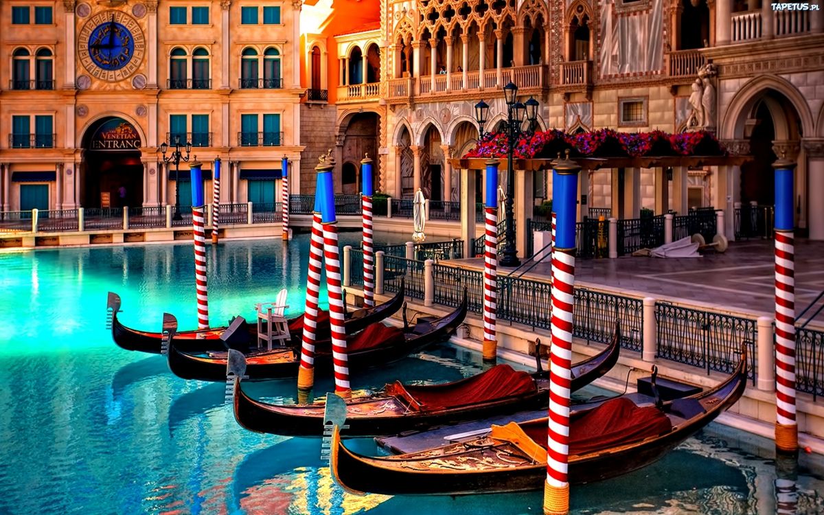 blue and brown wooden boat on water