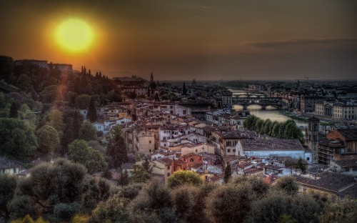 Image aerial view of city during sunset