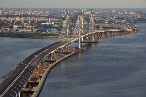 Image white bridge over body of water during daytime