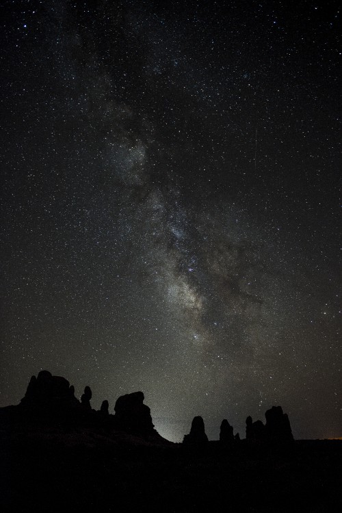 Image silhouette of people under starry night