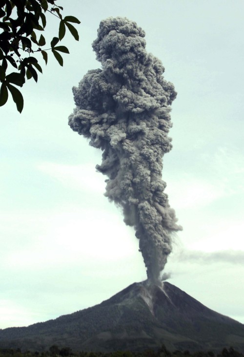 Image white smoke coming out from the black and white mountain