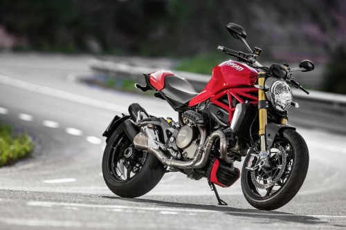 Image red and black sports bike on road during daytime