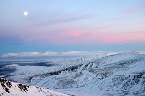 Image snow covered mountain under cloudy sky during daytime