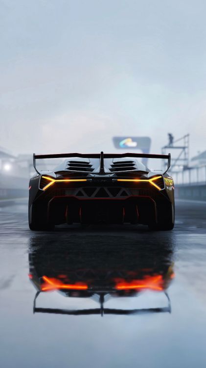 Voiture Noir et Argent Sur Sol Couvert de Neige. Wallpaper in 2160x3840 Resolution