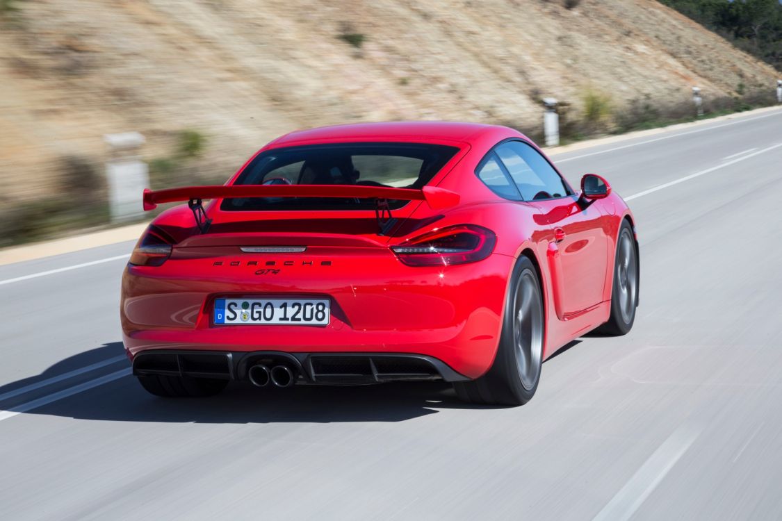 red porsche 911 on road during daytime