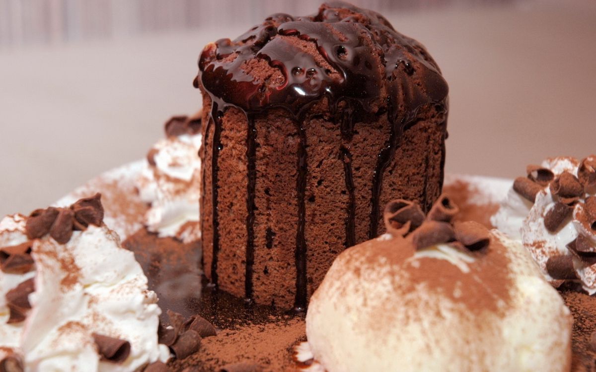 chocolate cake with chocolate syrup on top