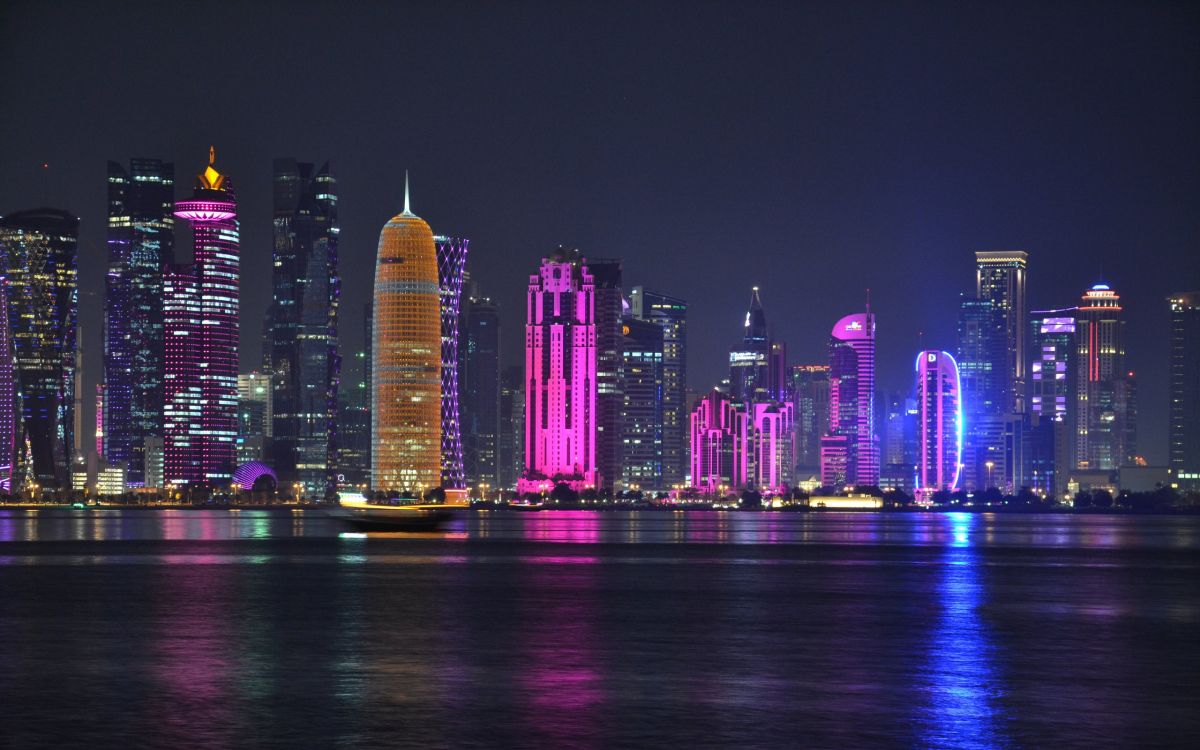 city skyline during night time