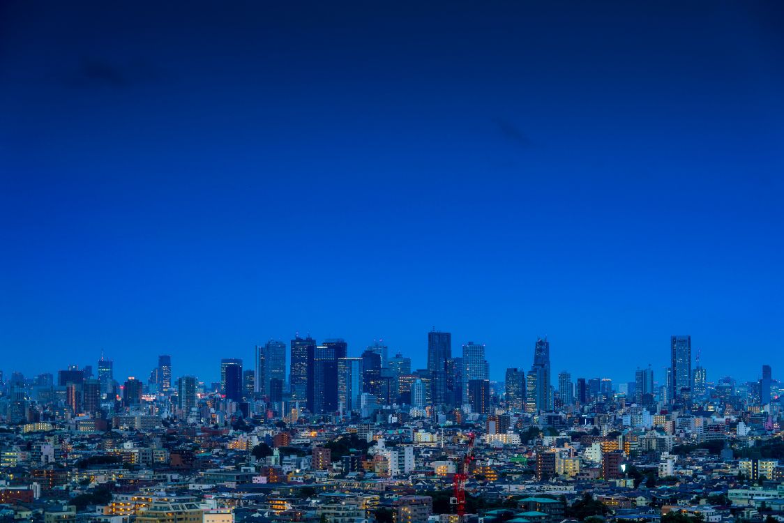 City With High Rise Buildings Under Blue Sky During Daytime. Wallpaper in 7952x5304 Resolution