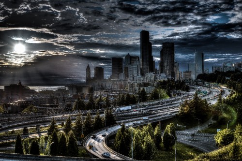 Image city buildings under gray clouds during daytime