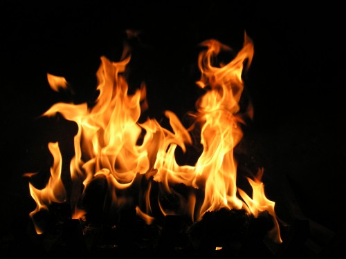 Image fire in black background with black background