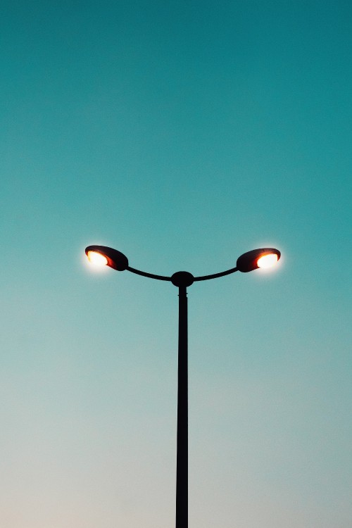 Image black and red street light during night time