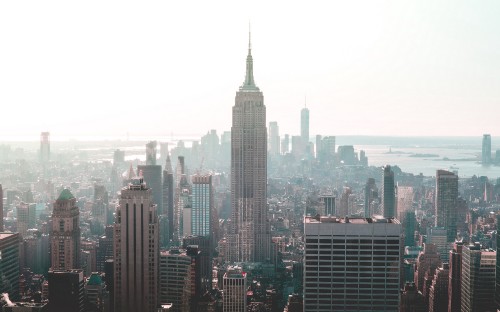 Image city skyline under white sky during daytime