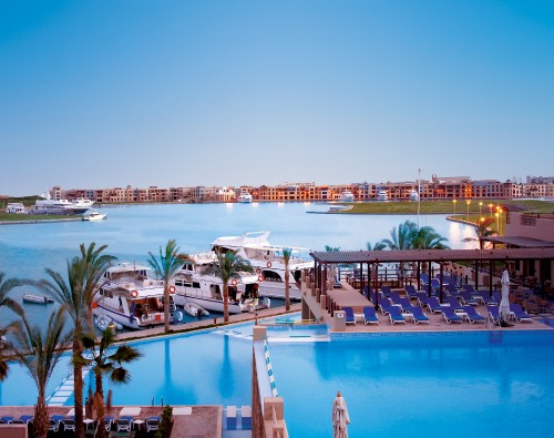 Image swimming pool near brown wooden dock during daytime