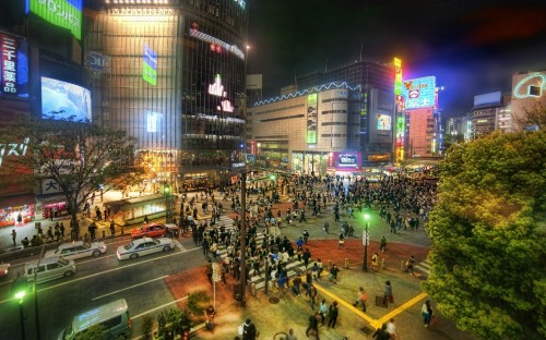 Image people walking on street during night time