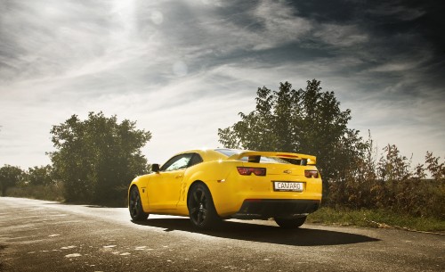 Image yellow porsche 911 on road during daytime