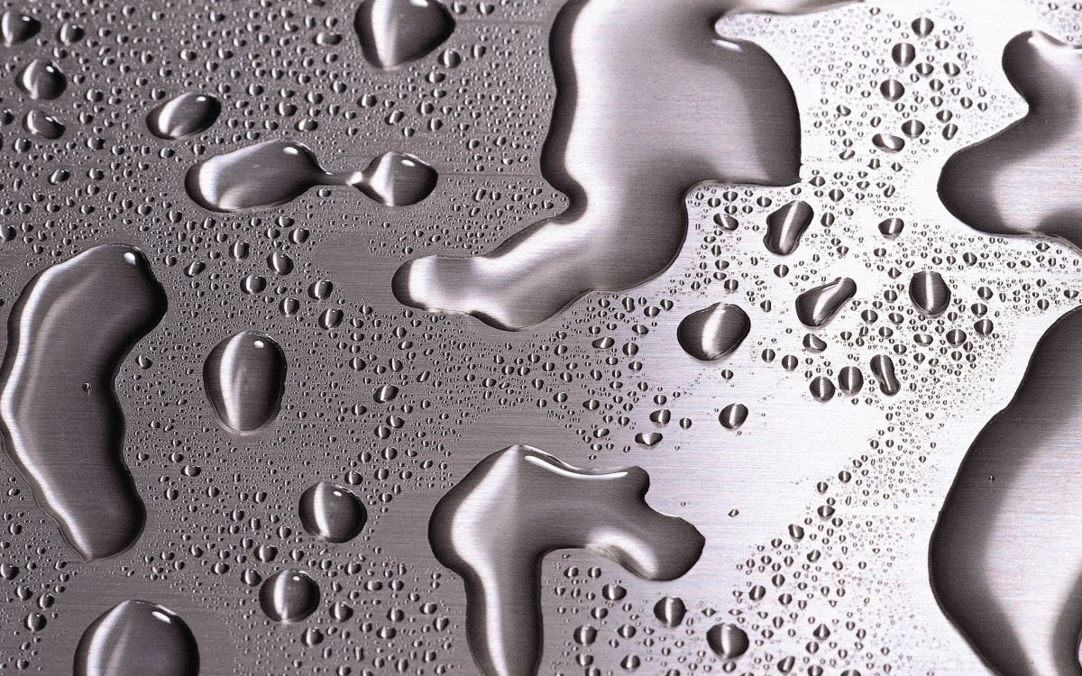 water droplets on gray surface