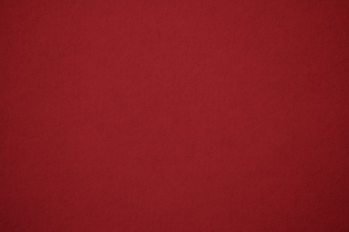 Image red textile on brown wooden table