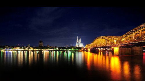 Image body of water near bridge during night time