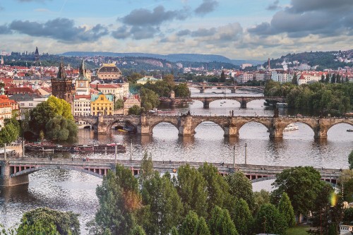 Image brown concrete bridge over river during daytime