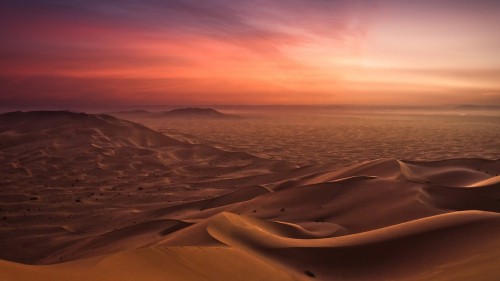 Image white sand under cloudy sky during daytime