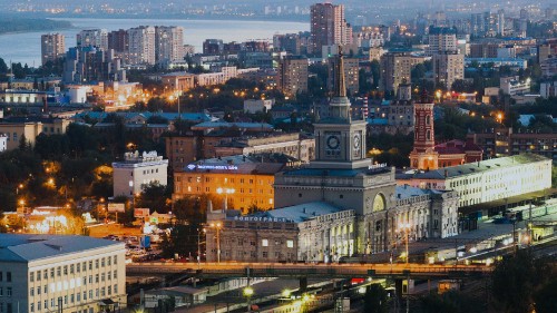 Image city with high rise buildings during night time