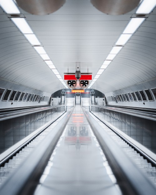 Image red and white train in tunnel